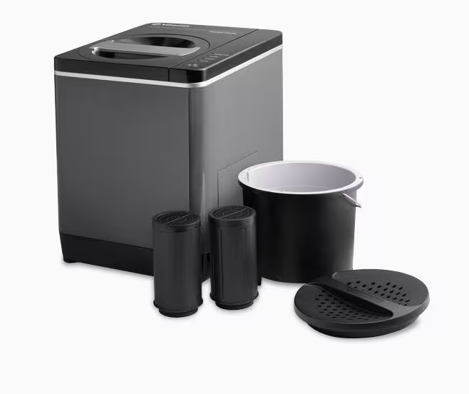 Vitamix FC-50 compact countertop composter. It isn't instant garden compost, but does reduce the food waste.